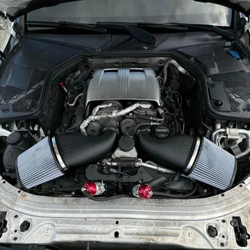 ModalWorks blow-off valve kit installed in a Mercedes-AMG C63 engine bay